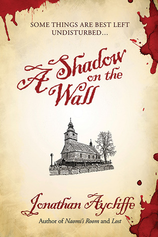 Una sombra en la pared: una novela