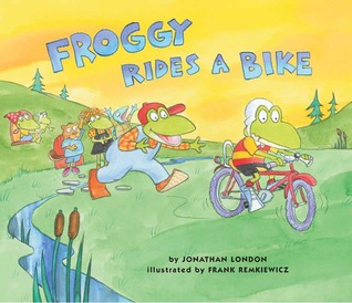 Froggy monta una bicicleta